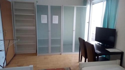 TV a/nebo společenská místnost v ubytování Vienna Rooms Nr 3