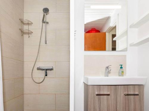 a bathroom with a shower and a sink at 6 person holiday home in Nykøbing M-By Traum in Alsted