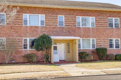 a red brick house with a white door at Cambridge Apt in Walkable Neighborhood in Cambridge