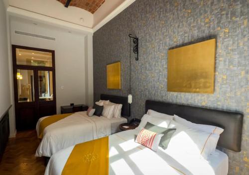 Letto o letti in una camera di Hotel Bellas Artes