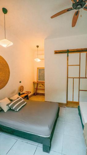 Ένα ή περισσότερα κρεβάτια σε δωμάτιο στο Ikiru House