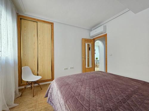 Postel nebo postele na pokoji v ubytování Bonito apartamento con piscina