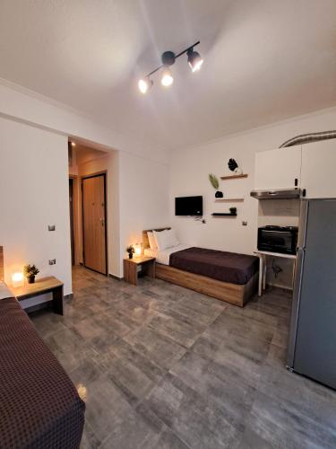 Postel nebo postele na pokoji v ubytování Mitende Apartments