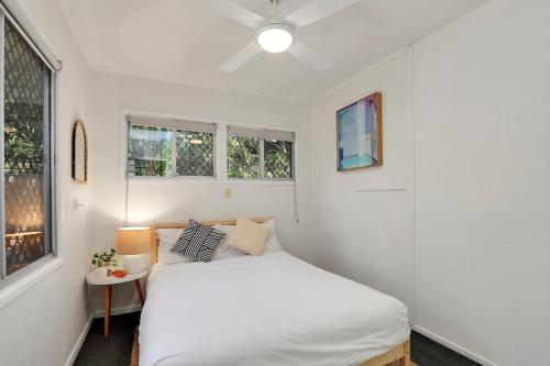 Ένα ή περισσότερα κρεβάτια σε δωμάτιο στο 16 Bigoon Road