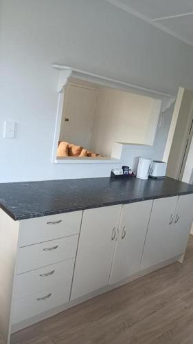 Η κουζίνα ή μικρή κουζίνα στο Serviced 3 Bedroom House