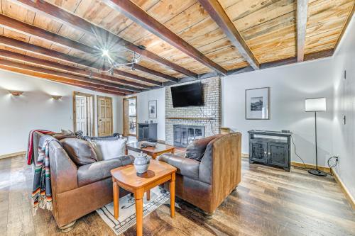 a living room with two couches and a fireplace at Walk to Midtown Ruidoso Modern-Rustic Cabin in Ruidoso