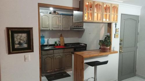 Η κουζίνα ή μικρή κουζίνα στο Confort mejor Ambiente familiar