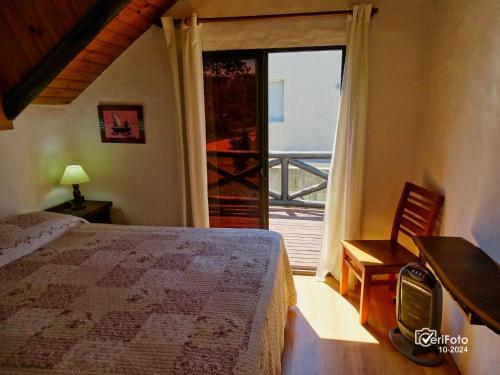 Postel nebo postele na pokoji v ubytování Bungalows Punta Colorada