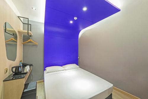 Hotel 81 Lavenderにあるベッド