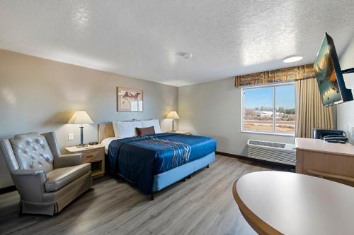 Postel nebo postele na pokoji v ubytování Budget Motel - Delta, Utah