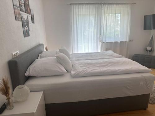 Postel nebo postele na pokoji v ubytování Ferienwohnung Kaiserblick