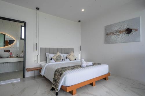 Postel nebo postele na pokoji v ubytování Gandum Villa Complex - Luxury Boutique Stay Uluwatu
