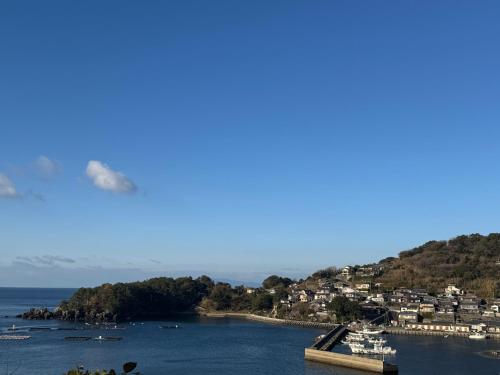 a view of a harbor with boats in the water at mare 稀 in Noda