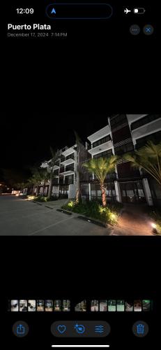 a picture of a building with a picture of a street at Brand New Beachfront Sunset Apartments in San Felipe de Puerto Plata