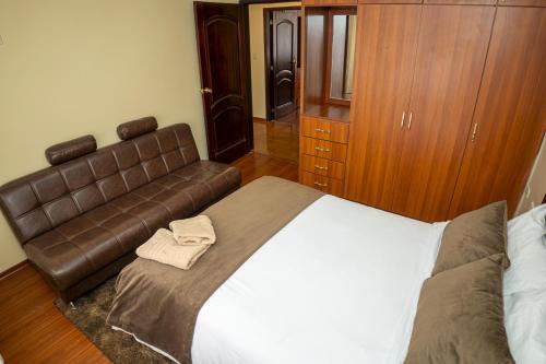 Ένα ή περισσότερα κρεβάτια σε δωμάτιο στο Casita Linda Baños