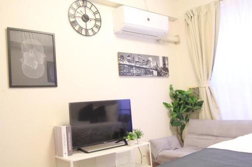 Una televisión o centro de entretenimiento en LUANA in BELUBEE