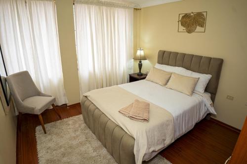 Ένα ή περισσότερα κρεβάτια σε δωμάτιο στο Casita Linda Baños