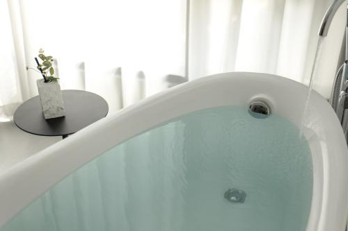 Un baño de Xishuangbanna Weilanzhuang Viila