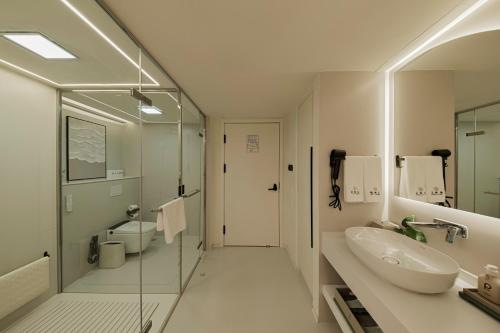Un baño de Xishuangbanna Weilanzhuang Viila
