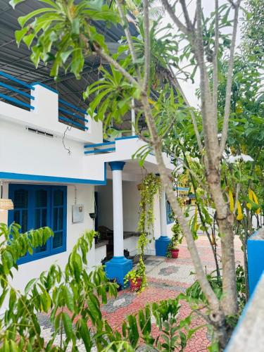 a view of a house from the garden at MOON VILLA 01 varkala 3bhk with kitchen in Varkala