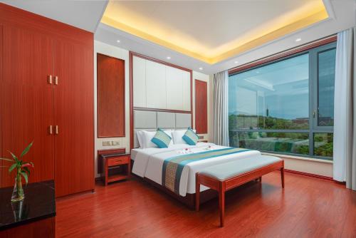 Ένα ή περισσότερα κρεβάτια σε δωμάτιο στο Chenzhou Zhuyuan Hotel