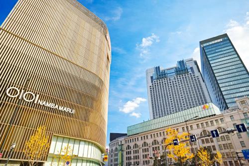 a group of tall buildings in a city at ゆいの宿大阪城east1号室 in Osaka