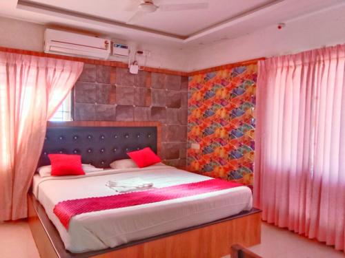 เตียงในห้องที่ VS HERITAGE INN