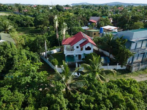 an aerial view of a house with a red roof at Sofias House Rental in Tagbilaran City