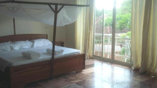 Katil atau katil-katil dalam bilik di Cozy Awesome place by Coco Beach in Oysterbay