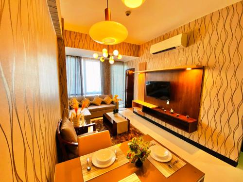 TV a/nebo společenská místnost v ubytování One Pacific