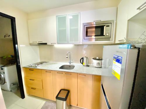 Kuchyň nebo kuchyňský kout v ubytování One Pacific