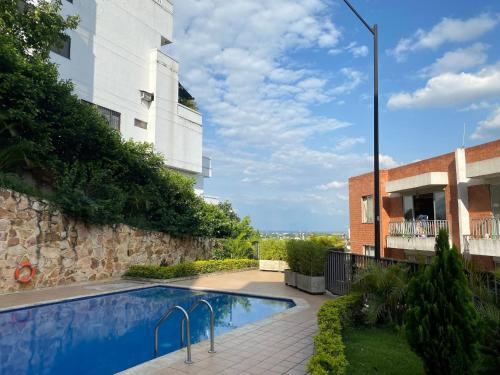 Bazén v ubytování Entire home in business luxury chipichape nebo v jeho okolí