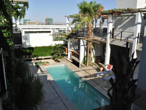 an aerial view of a house with a swimming pool at Villa Vista Guesthouse, Windhoek, Namibia in Windhoek