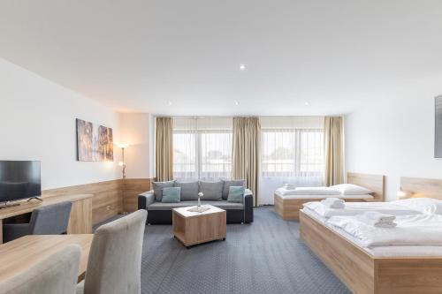 Giường trong phòng chung tại Sport HOTEL Centrum