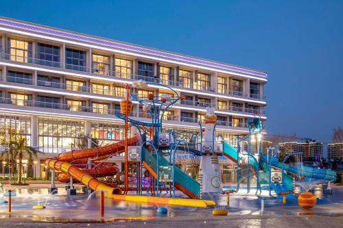Πισίνα στο ή κοντά στο Hainan Sangem Moon Hotel
