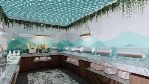 a restaurant with a buffet line with dishes at Novel Hotel Manila in Manila