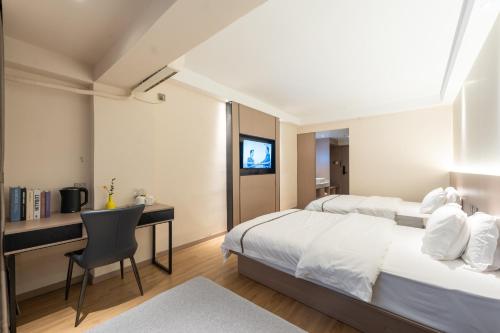 Veroia Hotel 维罗亚酒店にあるベッド