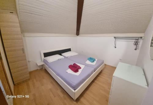 Postel nebo postele na pokoji v ubytování Apartments Febsis