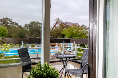 Bazén v ubytování APARTAMENTY przy plaży z basenem z podgrzewaną wodą i mini SPA - Ośrodek Kolonijno-Wczasowy Mewa nebo v jeho okolí
