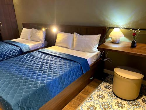 Ein Bett oder Betten in einem Zimmer der Unterkunft Hồng Lĩnh Hotel