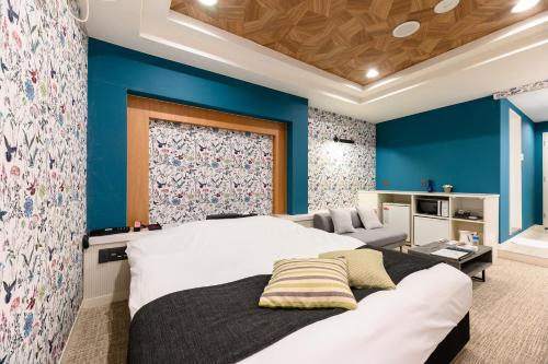 Postel nebo postele na pokoji v ubytování HOTEL FARINA DOLCE (Adult Only)