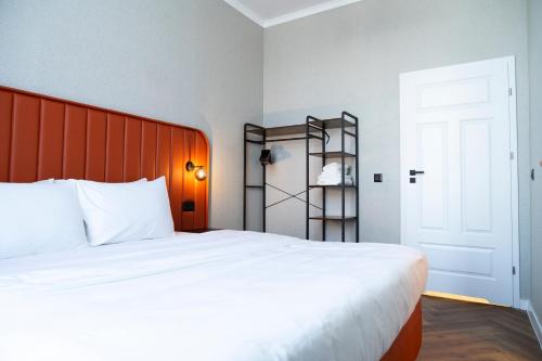 Ένα ή περισσότερα κρεβάτια σε δωμάτιο στο Unlimited Apartment- CENTRUM, faktura