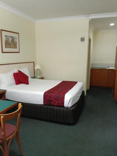 Ένα ή περισσότερα κρεβάτια σε δωμάτιο στο Bayswater Motel