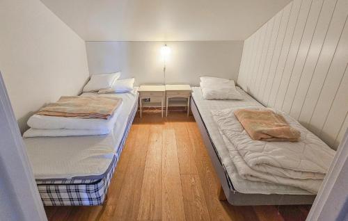 Ένα ή περισσότερα κρεβάτια σε δωμάτιο στο 5 Bedroom Cozy Apartment In Ustaoset