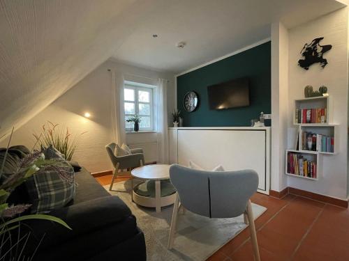 Posezení v ubytování Feriendorf Rugana - Komfortplus Ferienwohnung mit 1 Schlafzimmer A13