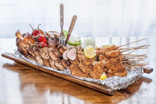 a large platter of food on a table at Hotel Kolonie in Frýdlant nad Ostravicí