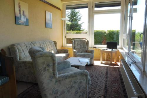 Posezení v ubytování Ferienhaus Am See