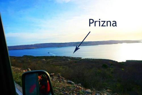 a view of a lake with a bird in the distance at Sunset Oase Am Meer in Prizna