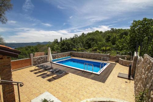 Πισίνα στο ή κοντά στο Geräumiges Ferienhaus In Brseč Mit Privatem Pool