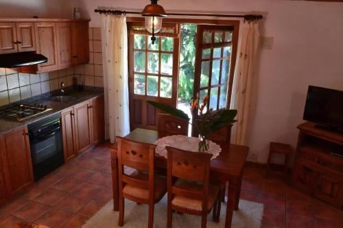 Kuchyň nebo kuchyňský kout v ubytování Ecofinca